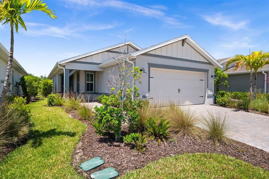 Front exterior of a new home in , Punta Gorda, FL, highlighting curb appeal (Image 2).