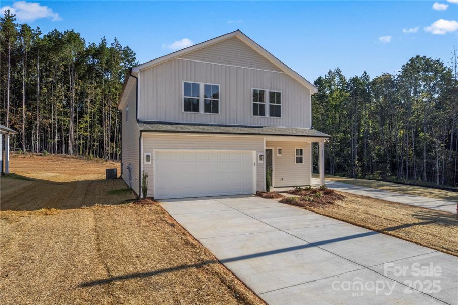 Front exterior of a new home in , Albemarle, NC, highlighting curb appeal (Image 20). Front exterior of a new home in , Albemarle, NC, highlighting curb appeal (Image 20).