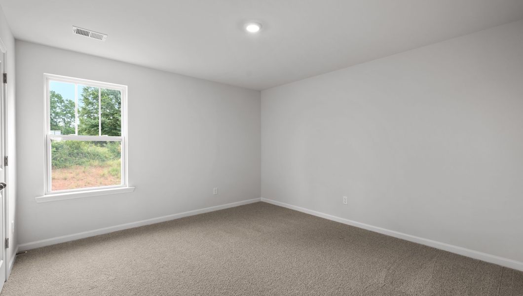 Representative unfurnished interior of a home built from the Biltmore by D.R. Horton in Woodglen, Piedmont (Image 18).