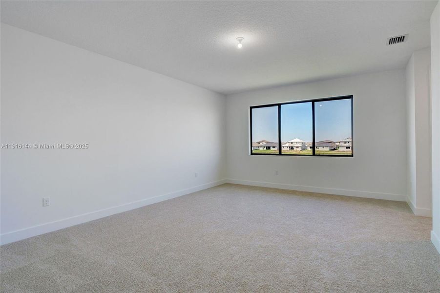 Spacious, unfurnished interior of a new home in , Ave Maria (Image 24).