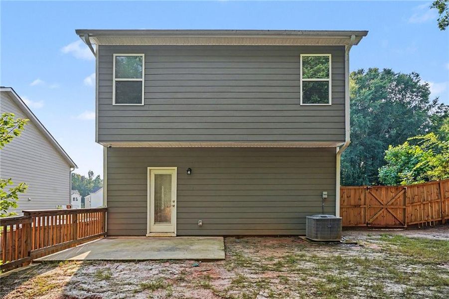Exterior details and patio area of a home in Campground Crossing, McDonough (Image 23).