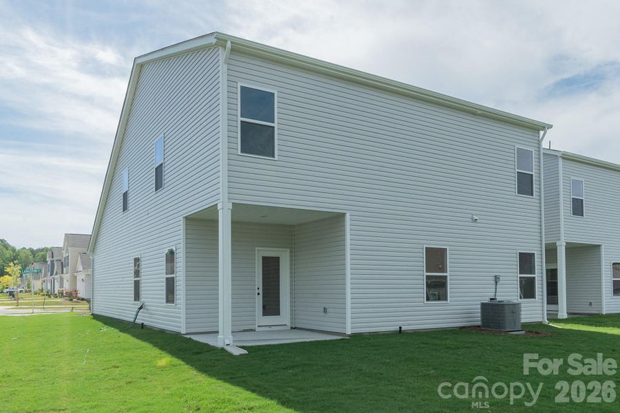 Exterior details and patio area of a home in Country Club Village, Salisbury (Image 22).
