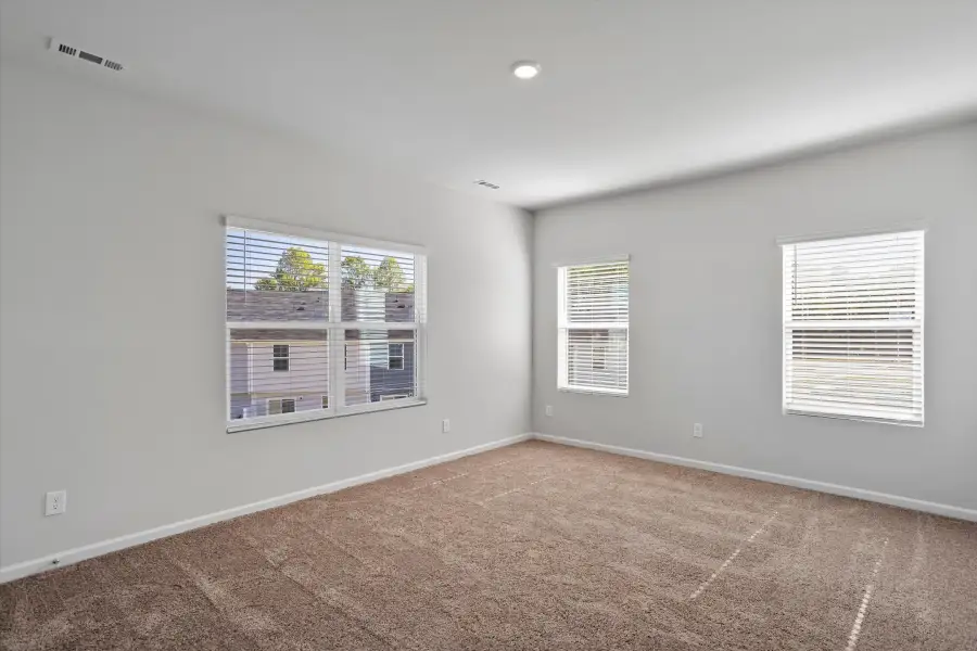 Spacious, unfurnished interior of a new home in West Main Townhomes, Sanford (Image 15).