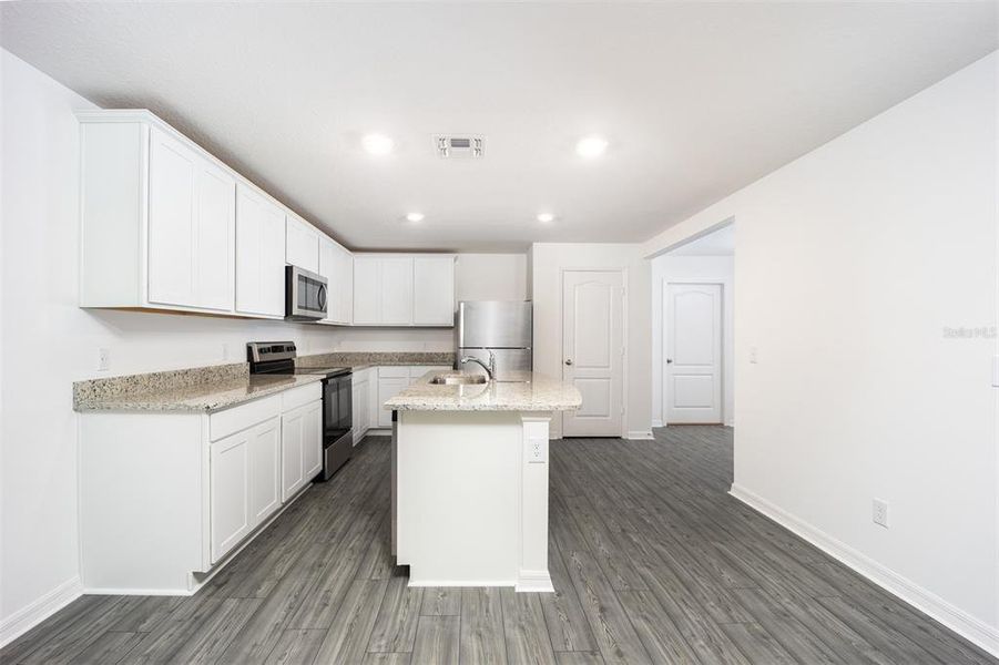 Furnished interior view inside a new home in Gum Lake Preserve, Lake Alfred (Image 5).