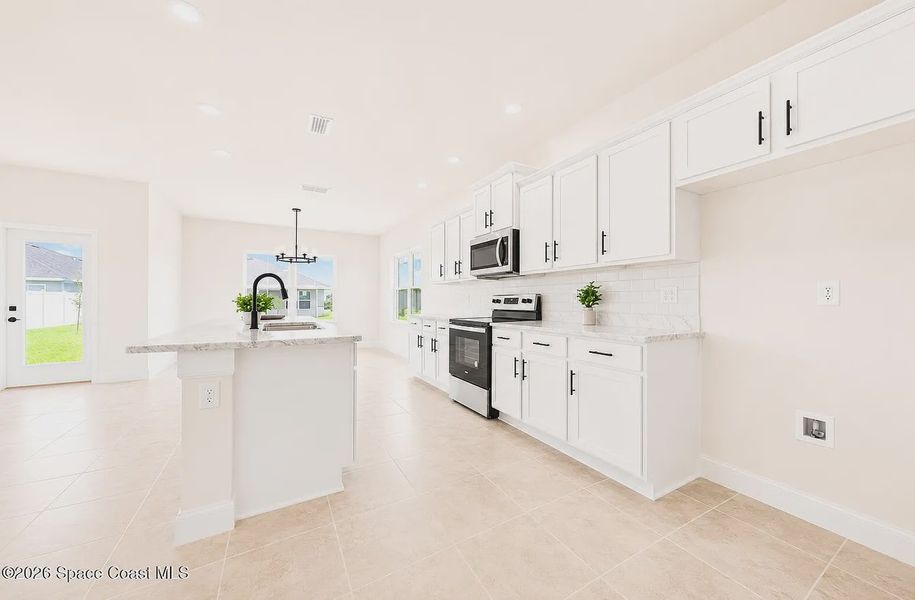 Furnished interior view inside a new home in St. John's Preserve, Palm Bay (Image 6).