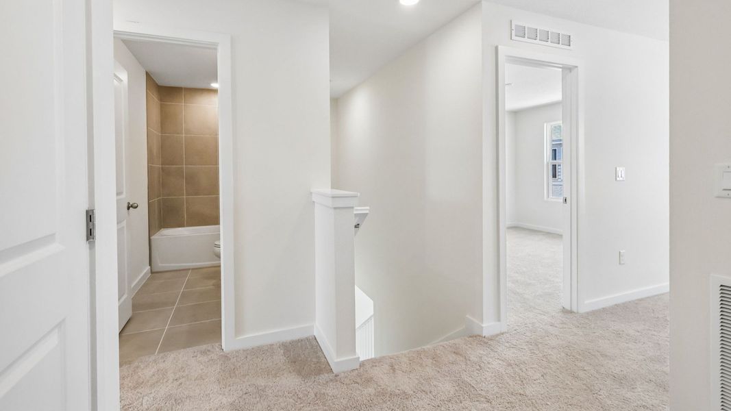 Furnished interior view inside a new home in Cyrene at Harmony, St. Cloud (Image 19). Furnished interior view inside a new home in Cyrene at Harmony, St. Cloud (Image 19).