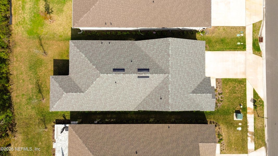 Exterior details and patio area of a home in Tributary, Yulee (Image 26).