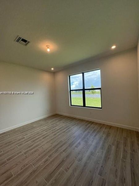 Spacious, unfurnished interior of a new home in Tradition - Cadence - Townhomes, Port St. Lucie (Image 9).