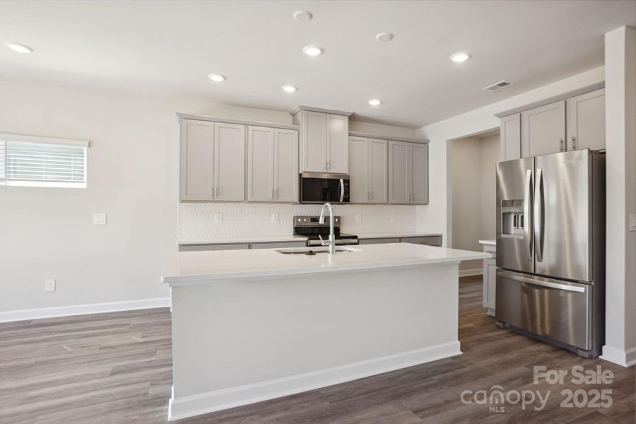 Photo is not of the actual home, but is an inspirational photo of builder’s model home and may depict options, furnishings, and/or decorator features that are not included