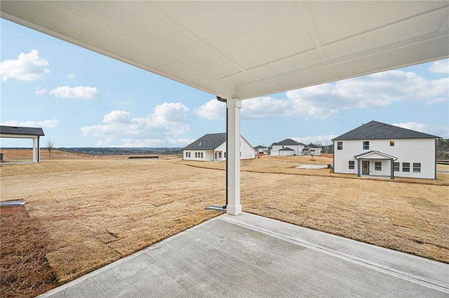 Exterior details and patio area of a home in River Pointe, Monroe (Image 25).