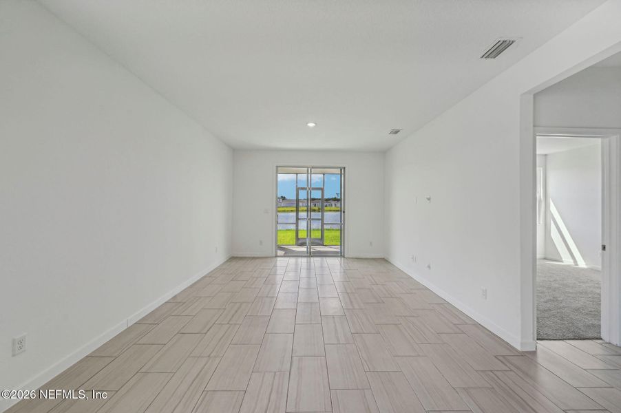 Spacious, unfurnished interior of a new home in Lakes at Bella Lago - Signature Series, Green Cove Springs (Image 23).