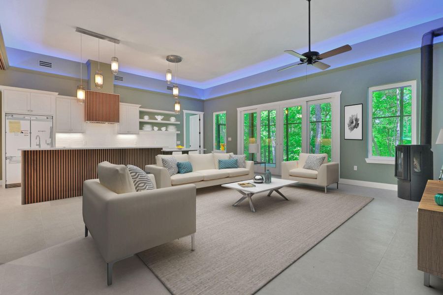 Virtually staged - the open concept living and kitchen area has high ceilings and ambient lighting