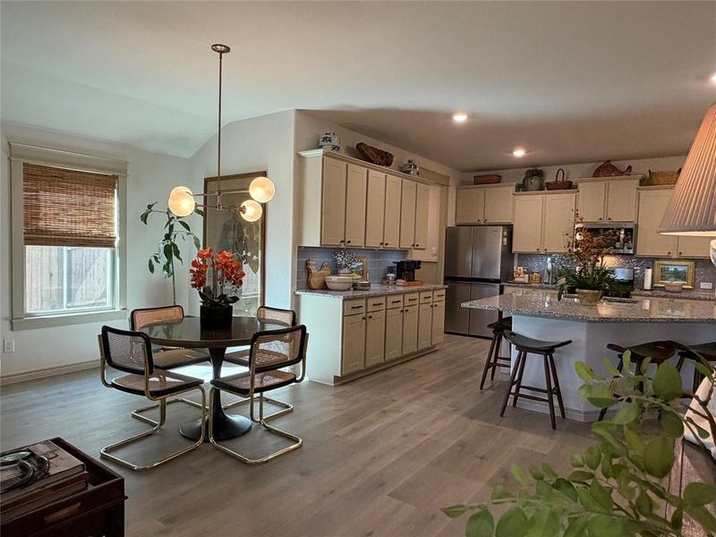 Open Dining and Kitchen. Upgraded Light Fixtures Interior and Exterior, Added Dimmers. Open Dining and Kitchen. Upgraded Light Fixtures Interior and Exterior, Added Dimmers.