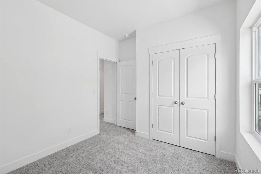 Spacious, unfurnished interior of a new home in Painted Prairie Cottage, Aurora (Image 31).