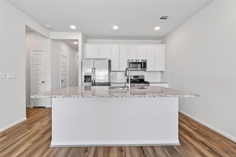 Furnished interior view inside a new home in , Magnolia (Image 13). Furnished interior view inside a new home in , Magnolia (Image 13).