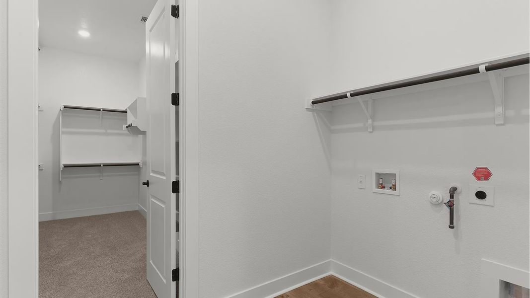 Representative unfurnished interior of a home built from the Drios by Chesmar Homes in Berry Creek Highlands, Georgetown (Image 29).