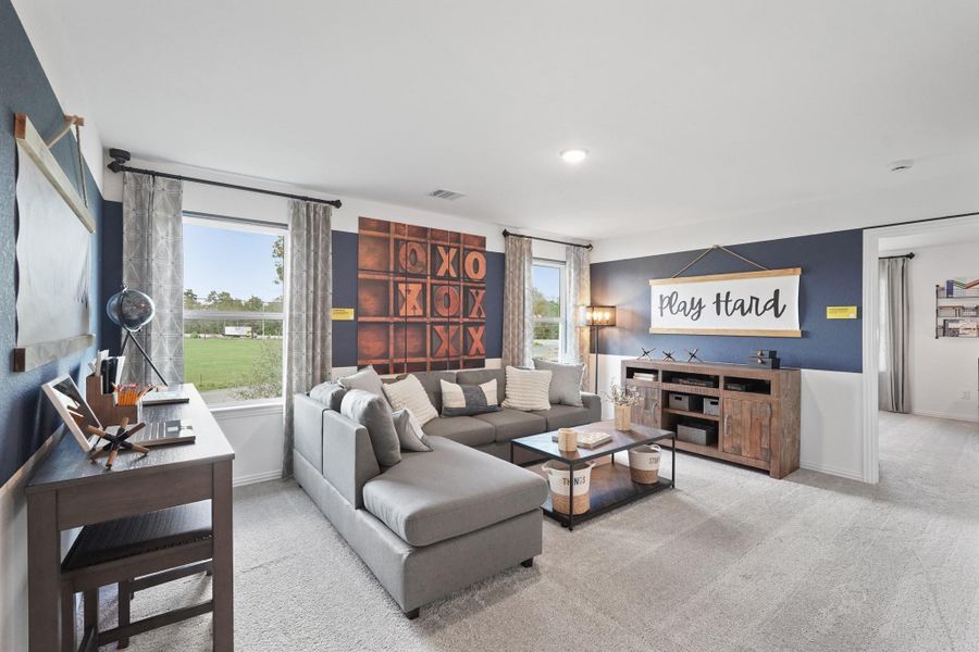 Whether you’re hosting friends for game night or enjoying a quiet evening with a good movie, this flex space seamlessly accommodates all your needs.