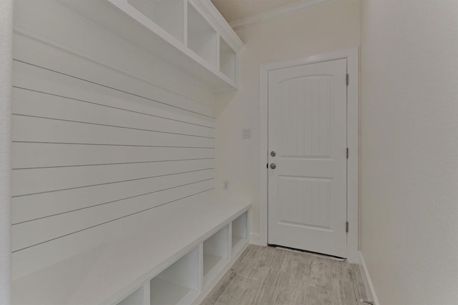 The "drop zone" from the garage is the perfect optimal space for shoes, bags, and keys! The "drop zone" from the garage is the perfect optimal space for shoes, bags, and keys!
