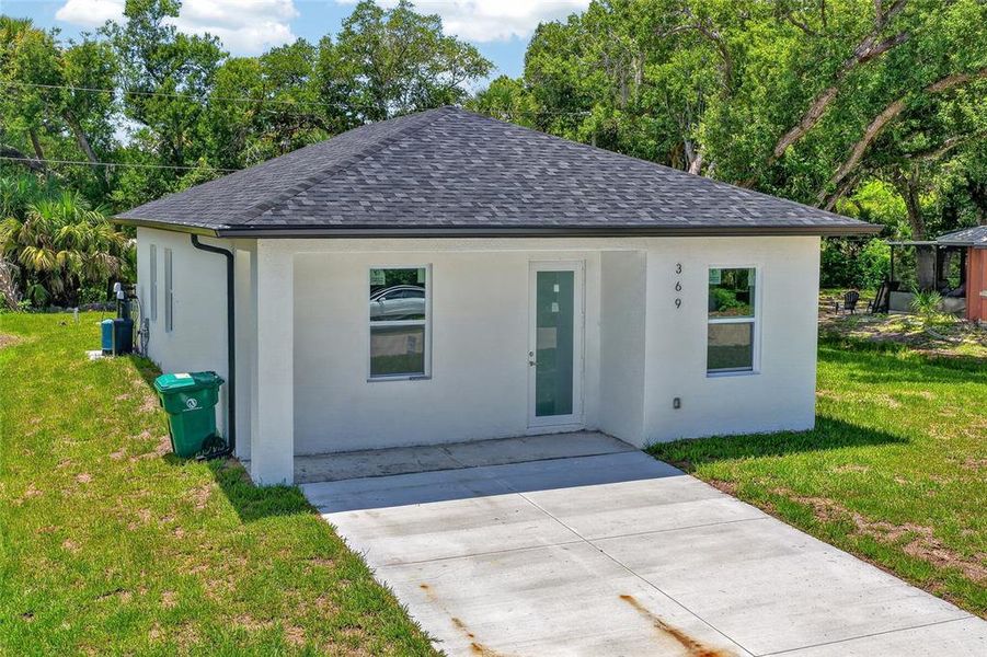 Exterior details and patio area of a home in , Port Charlotte (Image 2). Exterior details and patio area of a home in , Port Charlotte (Image 2).