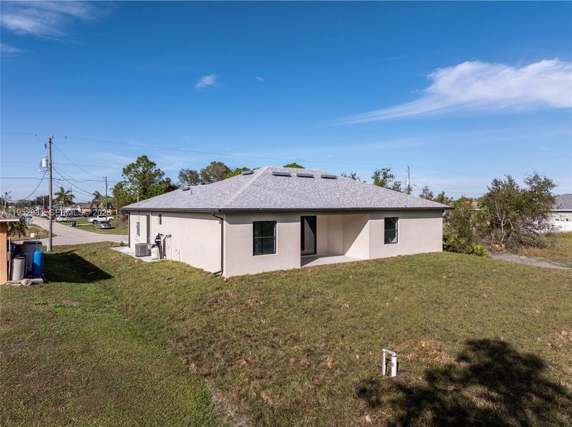 Exterior details and patio area of a home in , Lehigh Acres (Image 4). Exterior details and patio area of a home in , Lehigh Acres (Image 4).