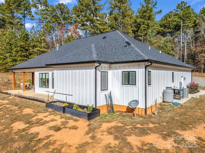 Exterior details and patio area of a home in , Mill Spring (Image 21).
