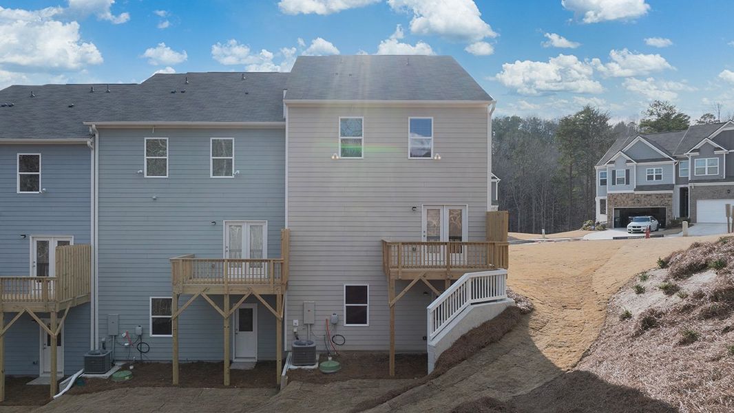 Exterior details and patio area of a home in Greyton Springs Place, Buford (Image 20).