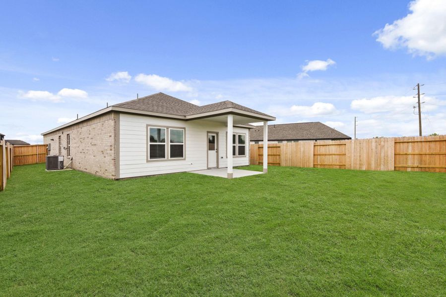 Exterior details and patio area of a home in River Ranch Trails, Dayton (Image 17). Exterior details and patio area of a home in River Ranch Trails, Dayton (Image 17).