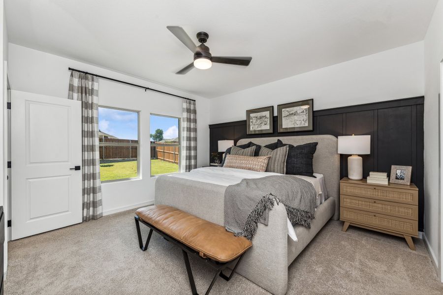 Primary suite with decorative feature wall