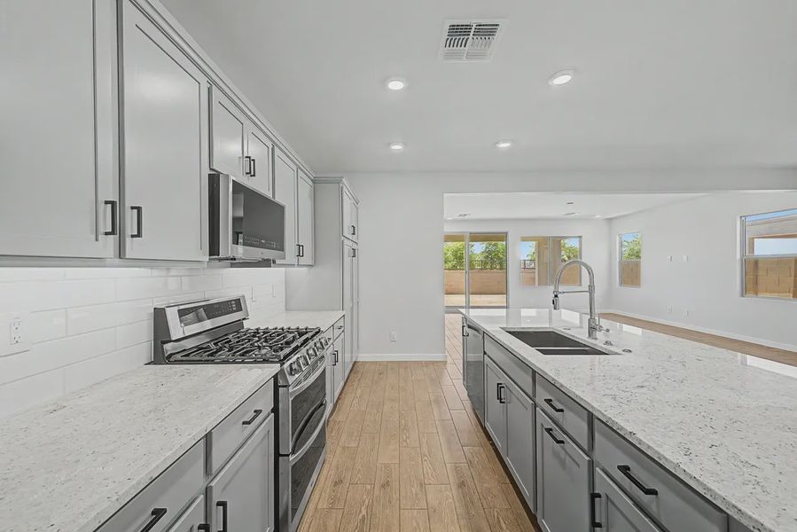 Furnished interior view inside a new home in Avanti at Granite Vista, Waddell (Image 8).