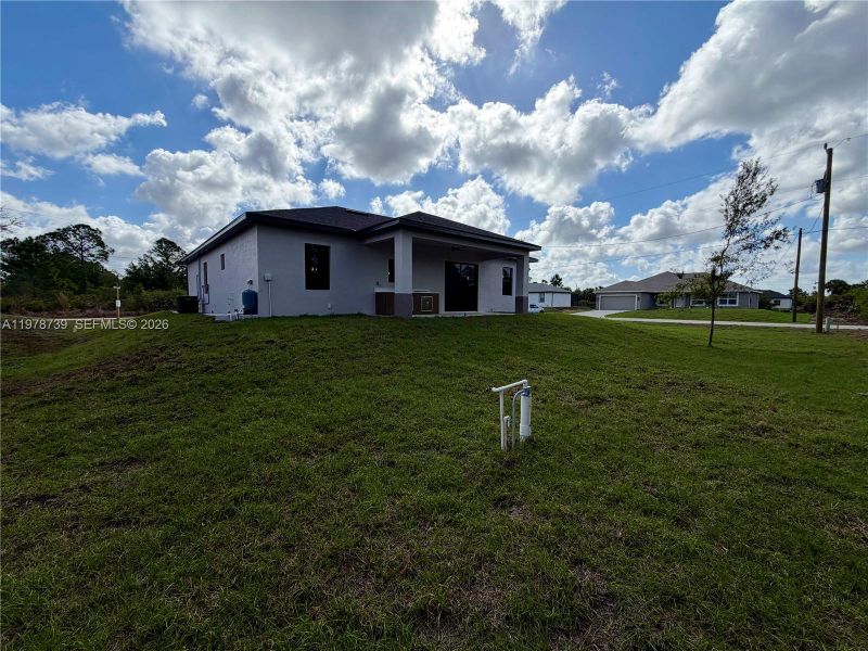 Exterior details and patio area of a home in , Lehigh Acres (Image 33).