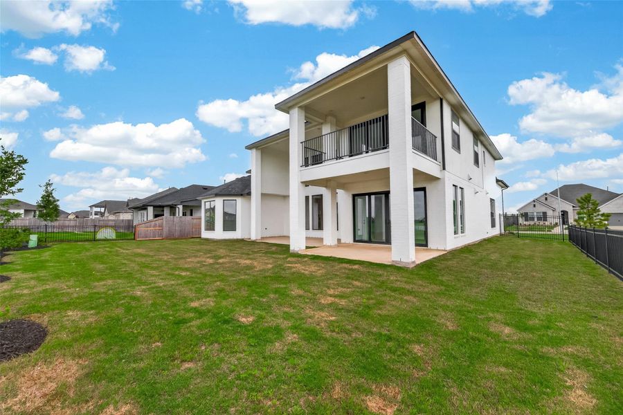 Exterior details and patio area of a home in , Brookshire (Image 28).