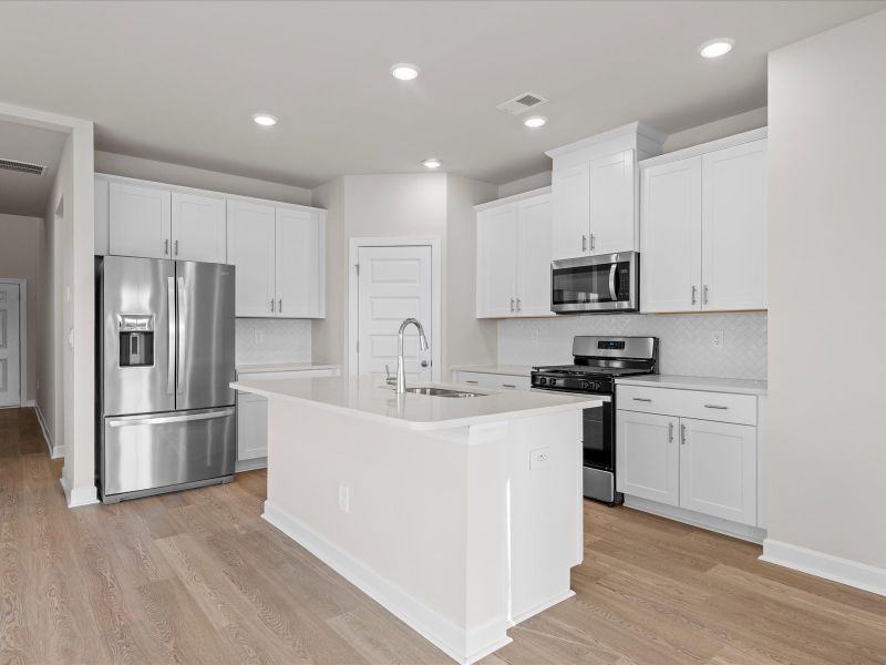 Furnished interior view inside a new home in Brayfield Manor - Heritage Collection, Wellford (Image 4).