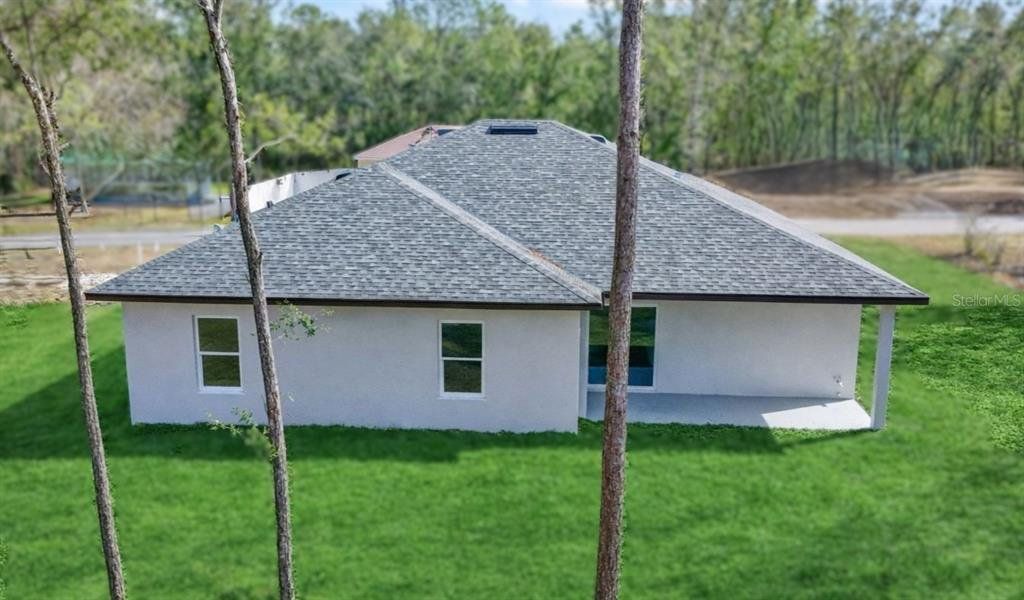 Exterior details and patio area of a home in , Citrus Springs (Image 23).