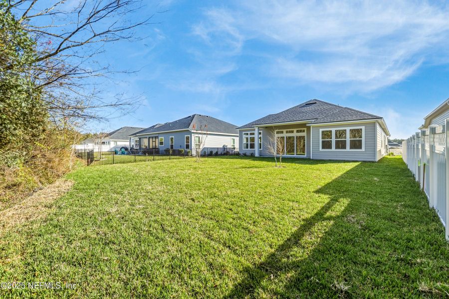 Exterior details and patio area of a home in Silver Landing at SilverLeaf, St. Augustine (Image 34).