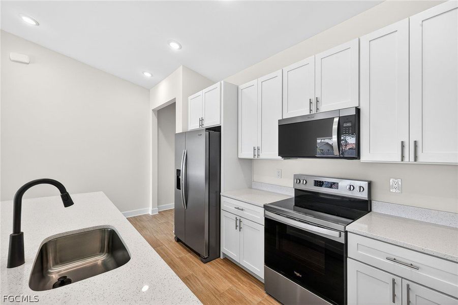 Furnished interior view inside a new home in Cape Coral, Cape Coral (Image 9).