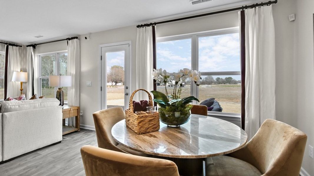 Furnished interior view inside a new home in North Village Townes, Greensboro (Image 12).