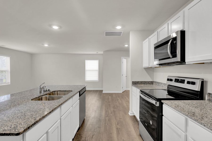 Representative furnished interior of a home built from the Aisle by D.R. Horton in Hawk's Ridge, Rossville (Image 5). Representative furnished interior of a home built from the Aisle by D.R. Horton in Hawk's Ridge, Rossville (Image 5).