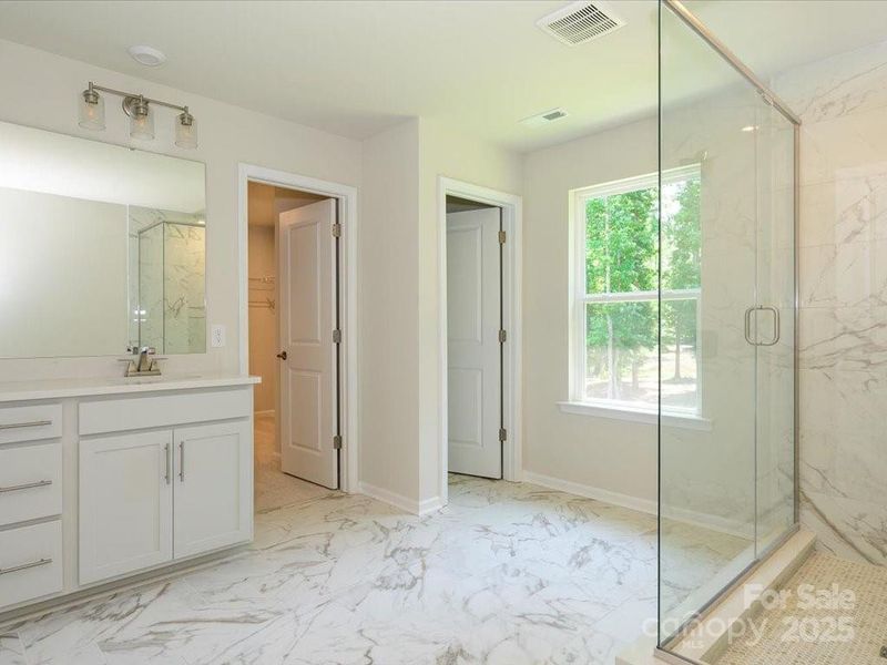 Modern yet classic, like going to the spa but it's in your own home. Modern yet classic, like going to the spa but it's in your own home.