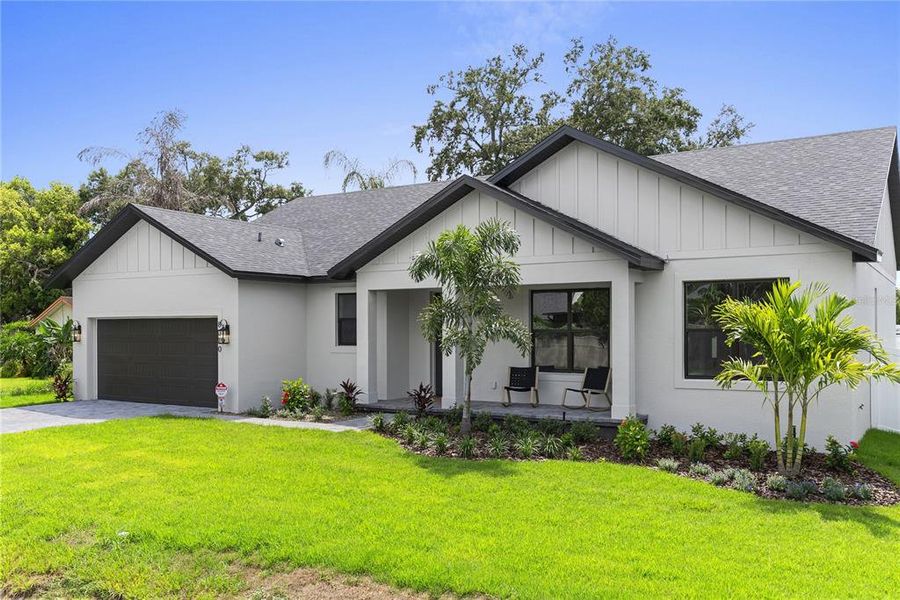 Front exterior of a new home in , Orlando, FL, highlighting curb appeal (Image 2). Front exterior of a new home in , Orlando, FL, highlighting curb appeal (Image 2).