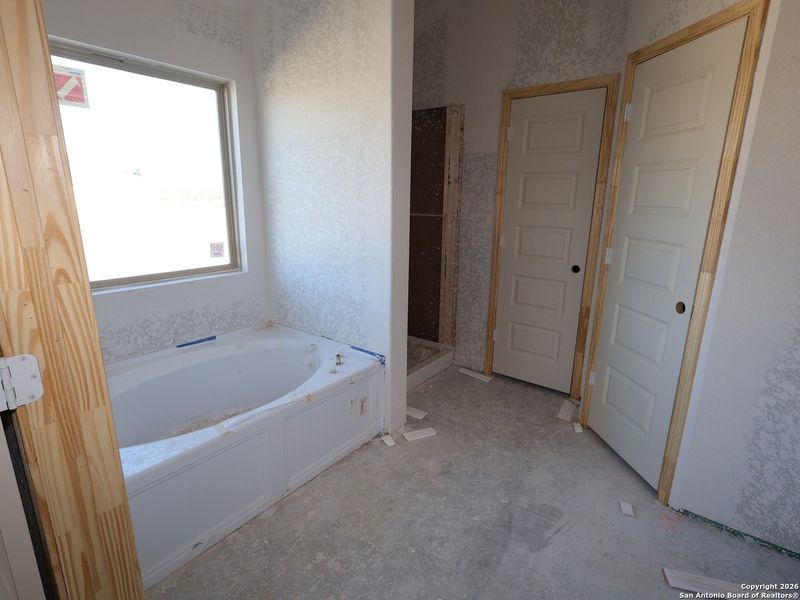 In-progress construction of a new home in Cinco Lakes, San Antonio, TX (Image 20).