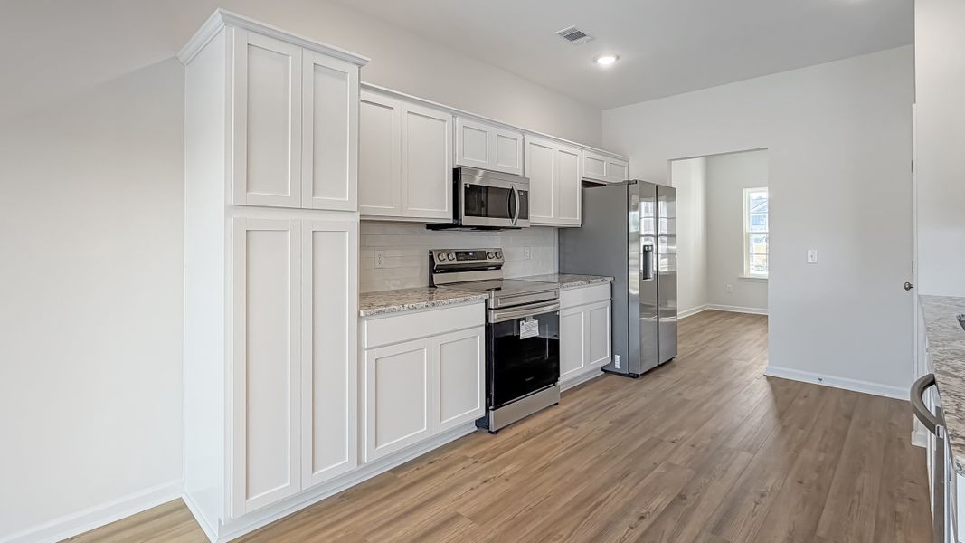 Furnished interior view inside a new home in Grand Reserve, Hinesville (Image 6).