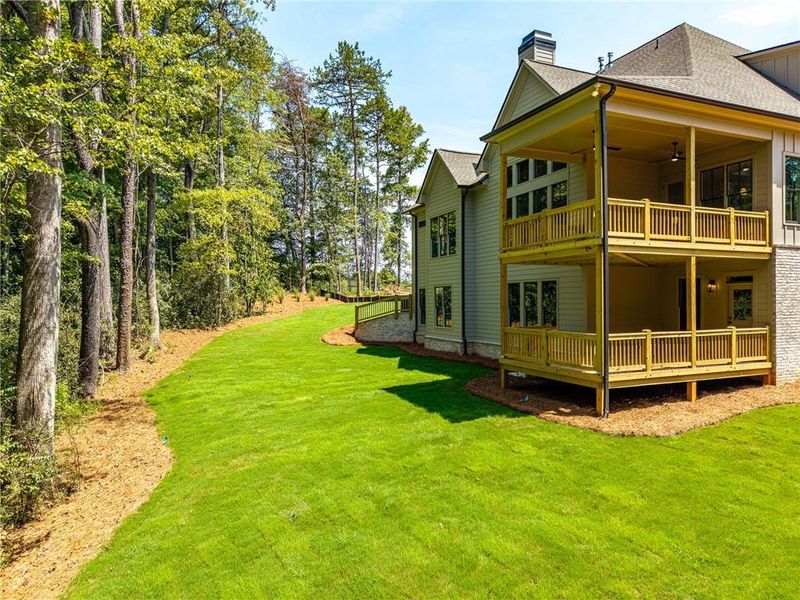 Exterior details and patio area of a home in Malone's Pond, Ball Ground (Image 4).