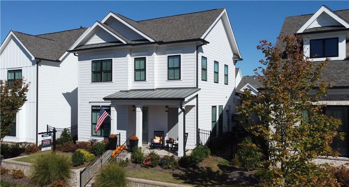 Front exterior of a new home in Idylwilde, Canton, GA, highlighting curb appeal (Image 20).
