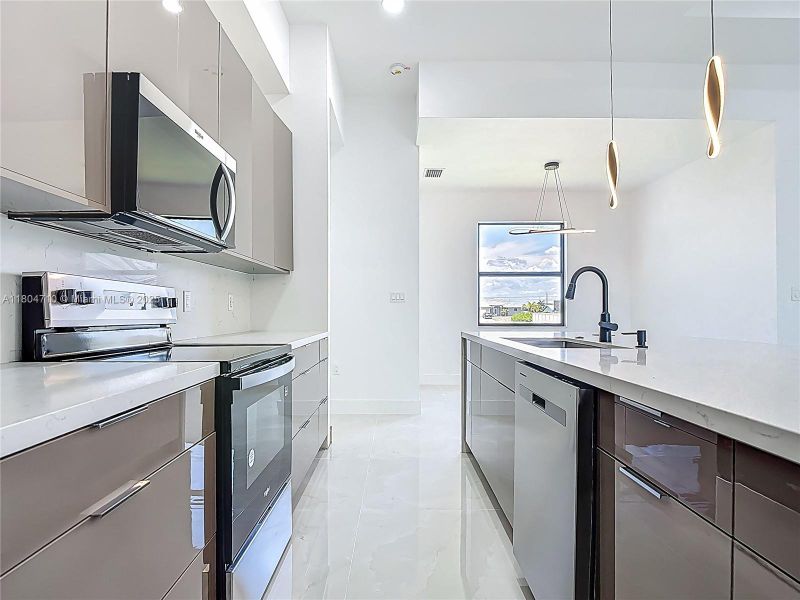 Furnished interior view inside a new home in , Cape Coral (Image 16). Furnished interior view inside a new home in , Cape Coral (Image 16).