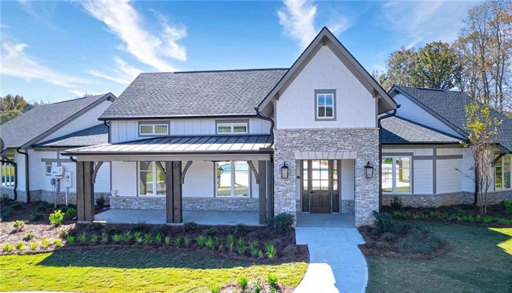 Front exterior of a new home in Twin Lakes, Hoschton, GA, highlighting curb appeal (Image 2).