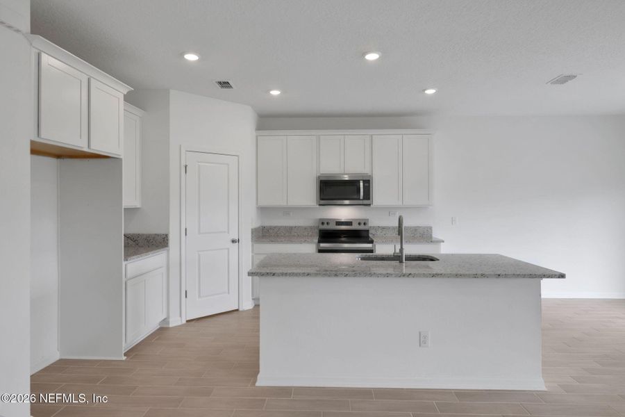 Furnished interior view inside a new home in Wilford Oaks, Orange Park (Image 13).