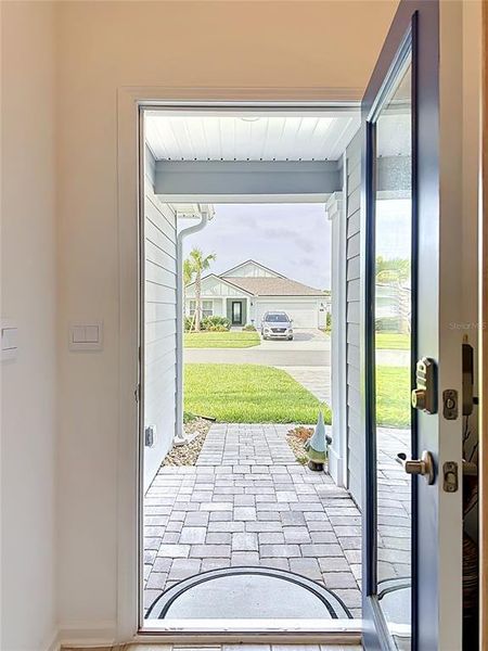Exterior details and patio area of a home in Sawmill Branch Express, Palm Coast (Image 4).