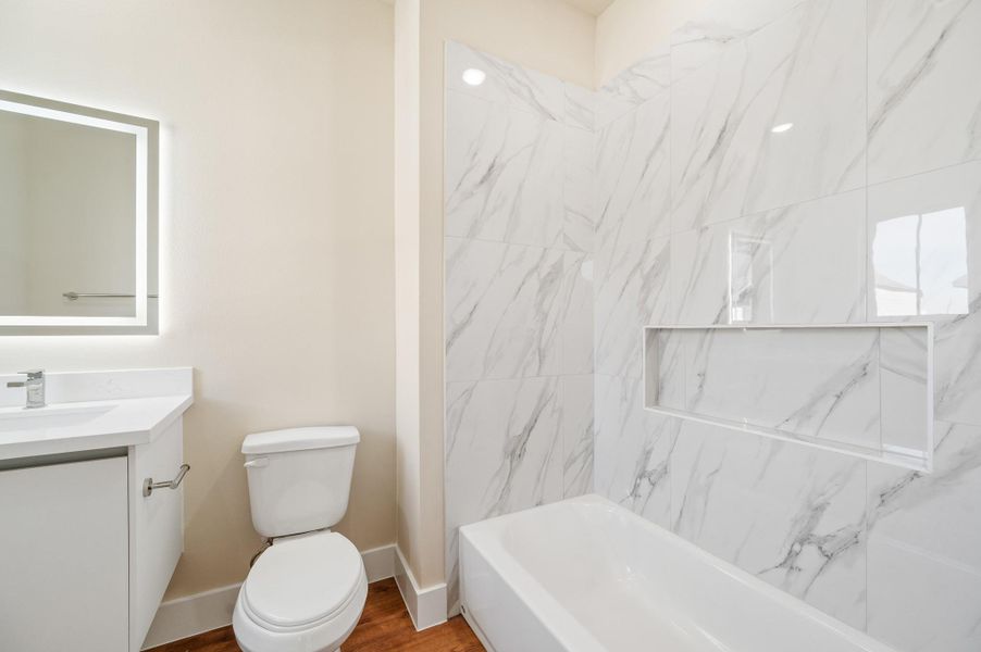 Furnished interior view inside a new home in Metro Village, Houston (Image 8).