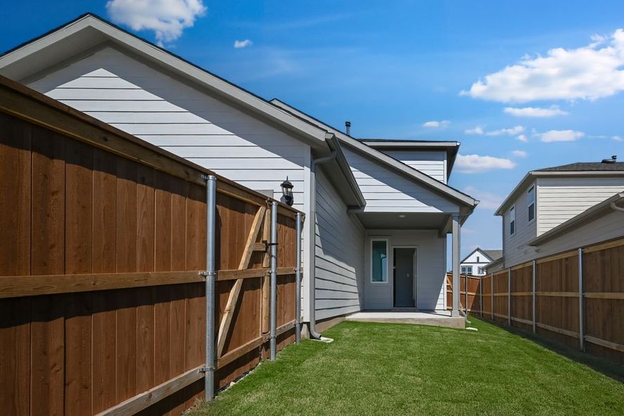 Exterior details and patio area of a home in Emory Crossing 40s, Hutto (Image 3). Exterior details and patio area of a home in Emory Crossing 40s, Hutto (Image 3).