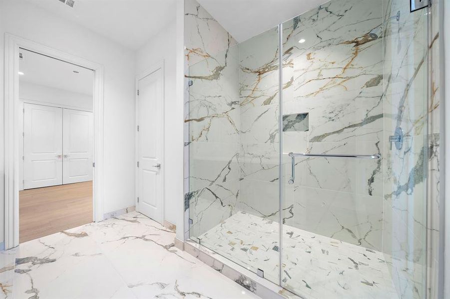 Hollywood bath: private water closet and oversized shower complete this space.